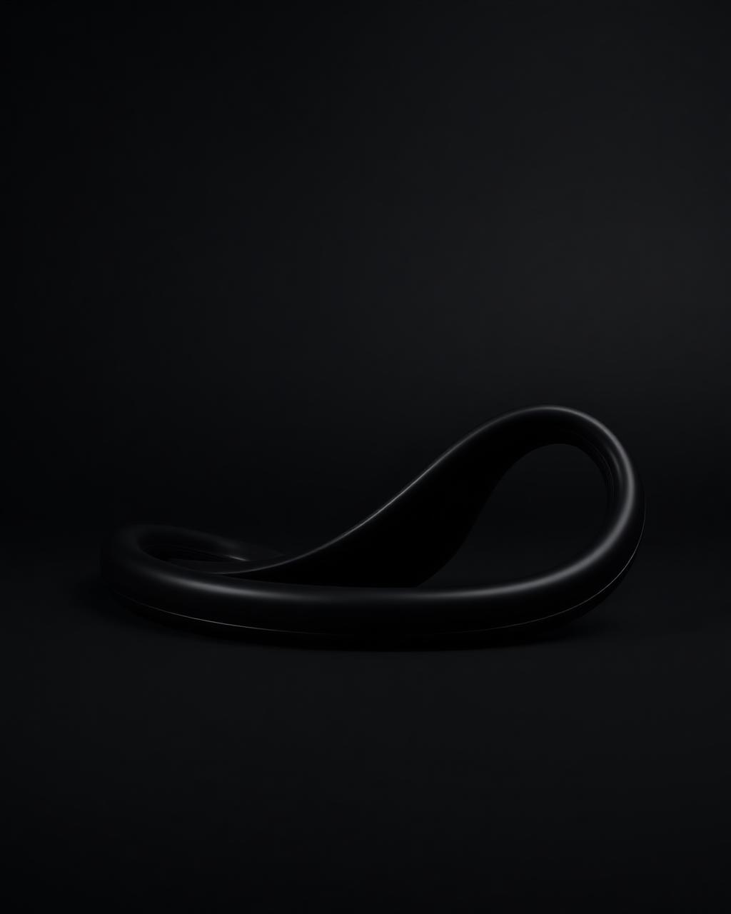 Design sketches and tools beside reclaimed rubber